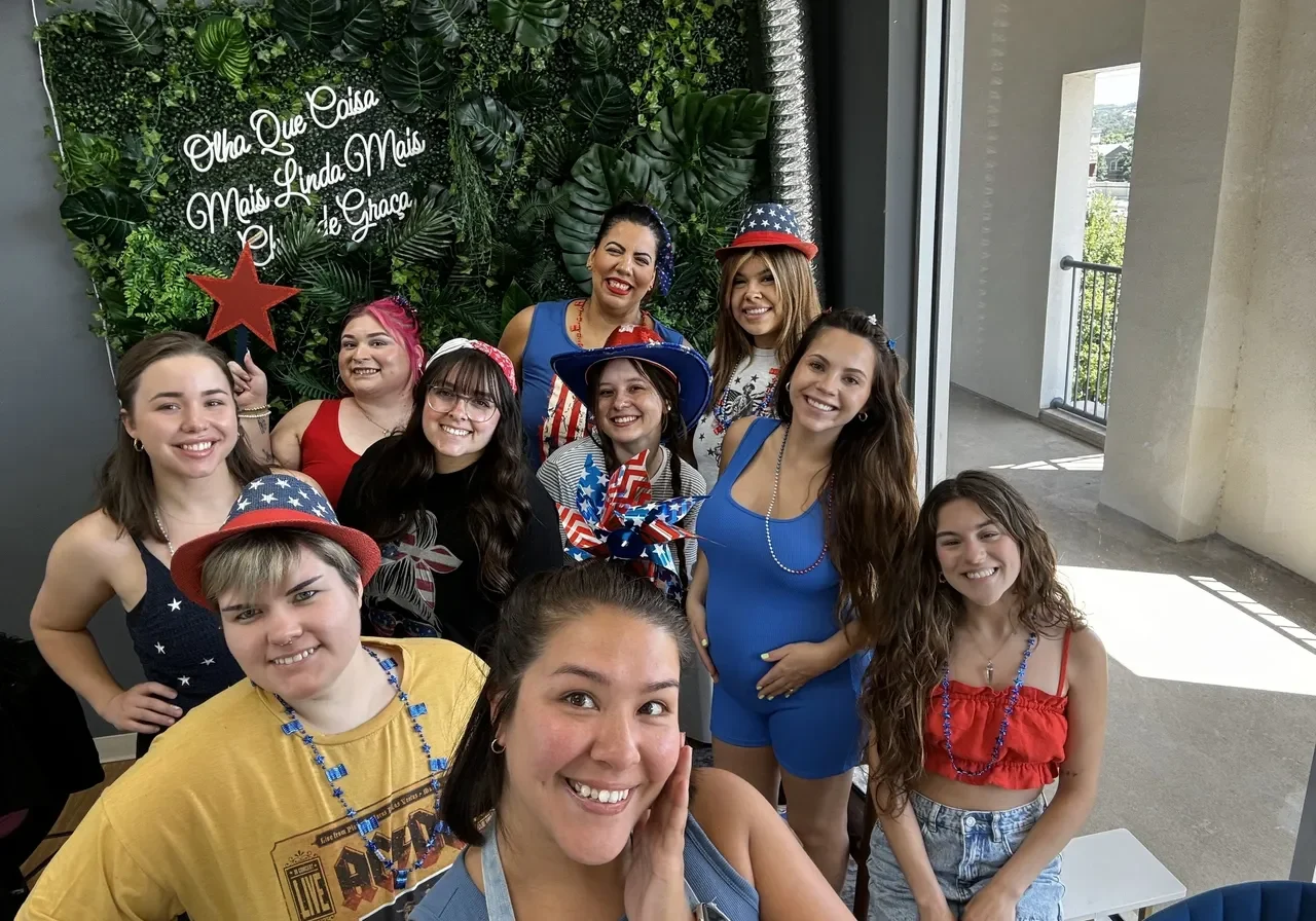 A group of people posing for the camera.